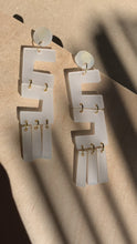 Load and play video in Gallery viewer, Frosted White Open Maze Dangles- Elegant Acrylic Laser Cut Earrings
